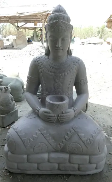 Product image of the product “Seated Buddha in Thai style made of Riverstone, Holds a vessel in his hands, H. 154cm. ”
